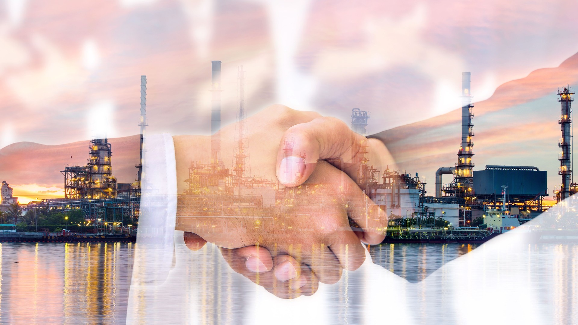Double exposure of business handshake and oil refinery plant. Business people shaking hands in the office. Finishing successful meeting